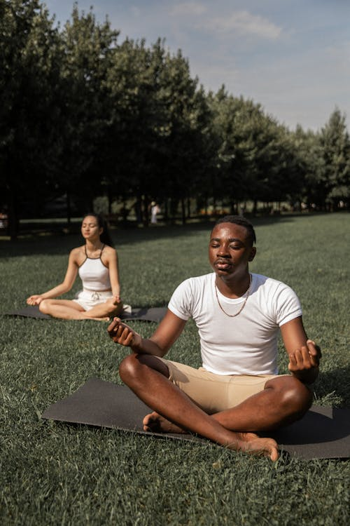 a couple doing yoga